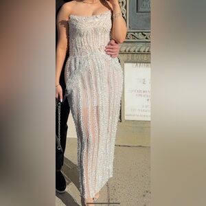 Evening gown dress worn only once to a wedding .